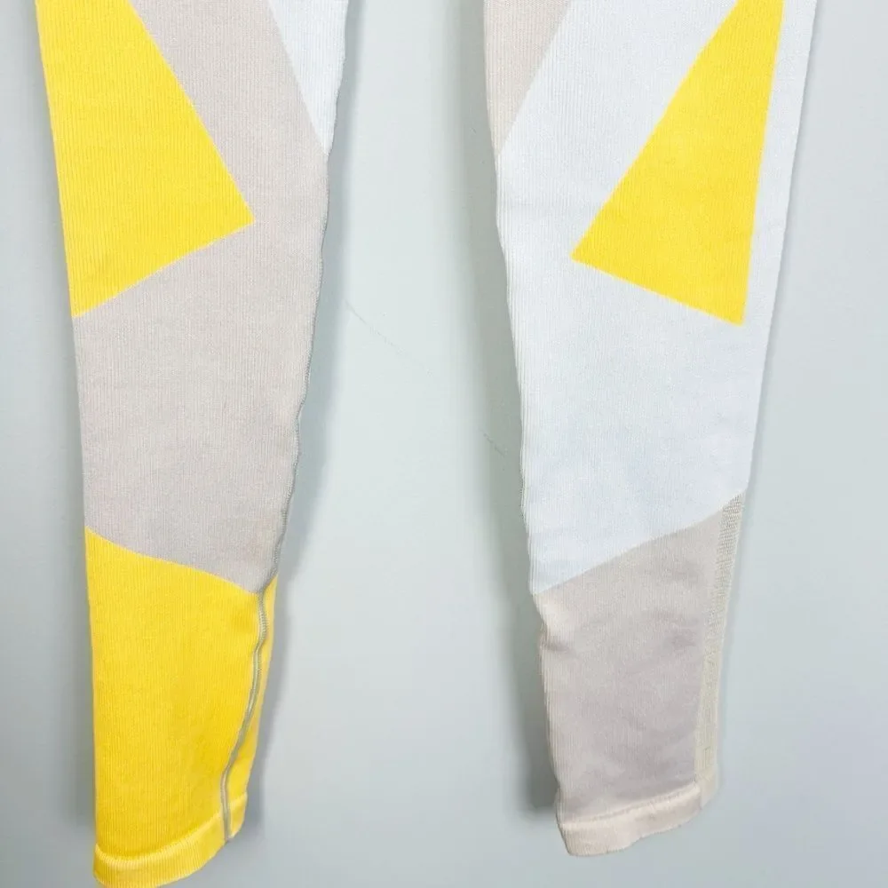 NIKE | Dri Fit Sculpt Icon Clash Cropped Leggings Yellow Gray Tan Women’s Size M